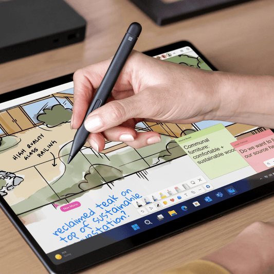Microsoft Surface vs Apple MacBook – Full Comparison Guide for UAE Buyers - axon