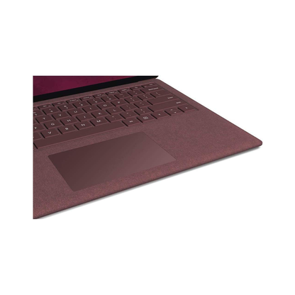 Microsoft Surface Laptop 2 with i7 processor, 16GB RAM, 512GB SSD, burgundy 13.5-inch touchscreen, open on a desk.